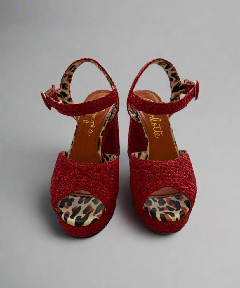 Red Charlotte Olympia raffia platform heels with ankle strap, featuring a chunky heel and leopard-print lining, worn only once, size IT 38, made in Italy.