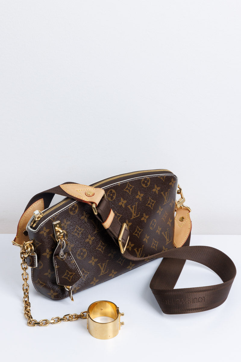 Louis Vuitton Classic Monogram Canvas Defile Femme Fetish Clutch Bag | Timeless Luxury