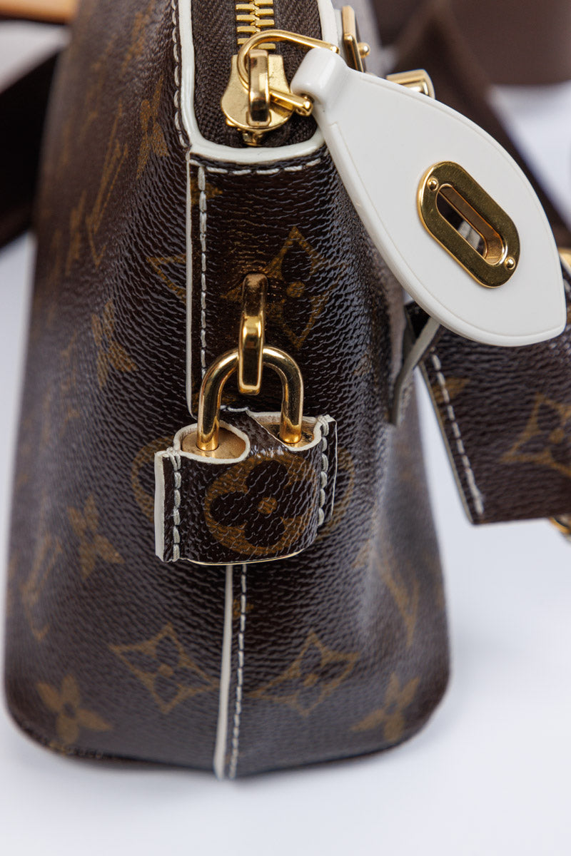 LOUIS VUITTON Classic Monogram Canvas Defile Femme Fetish Clutch Bag | Timeless Luxury