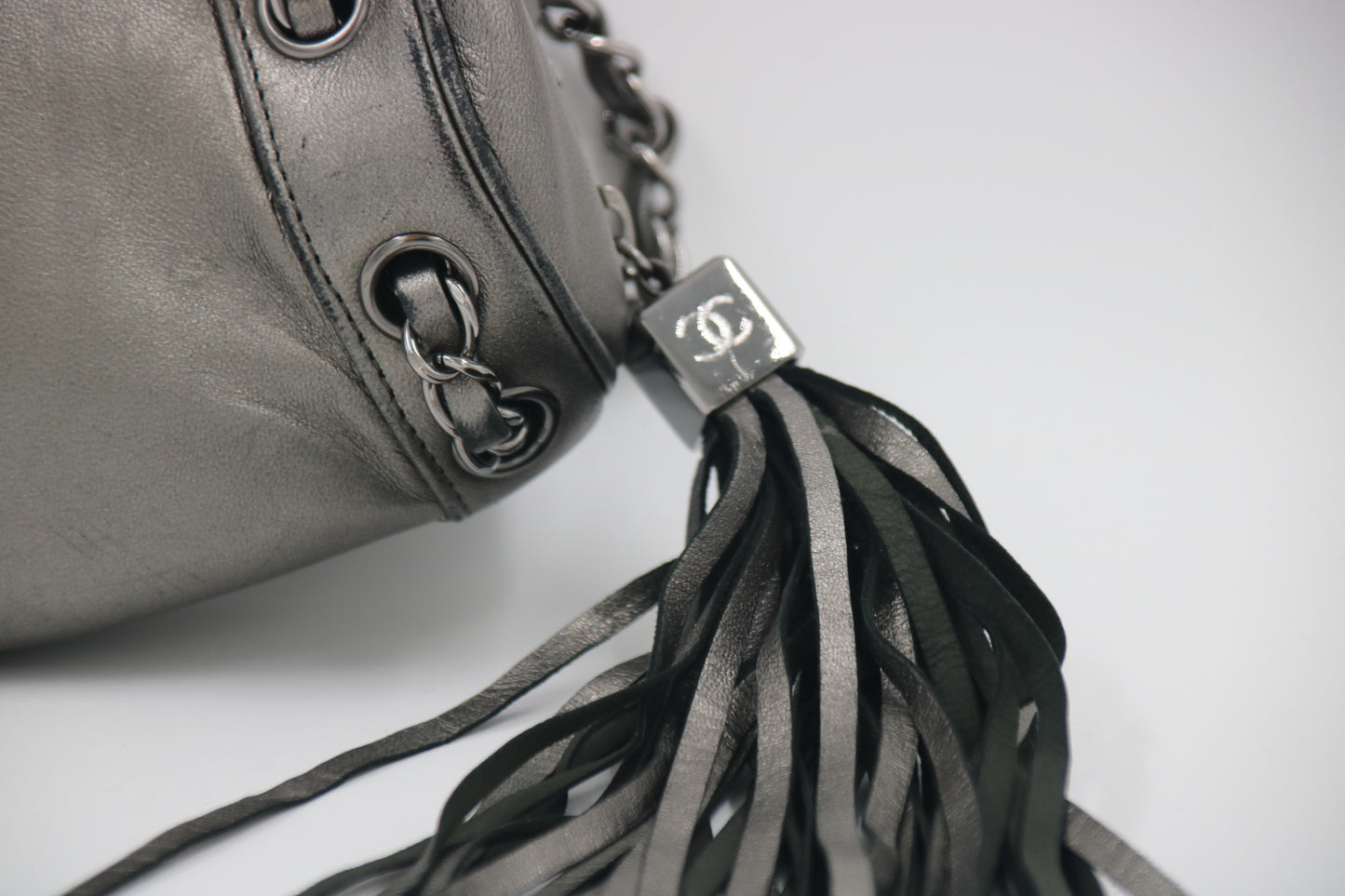 CHANEL Metallic Grey Leather Tassel Evening Bag