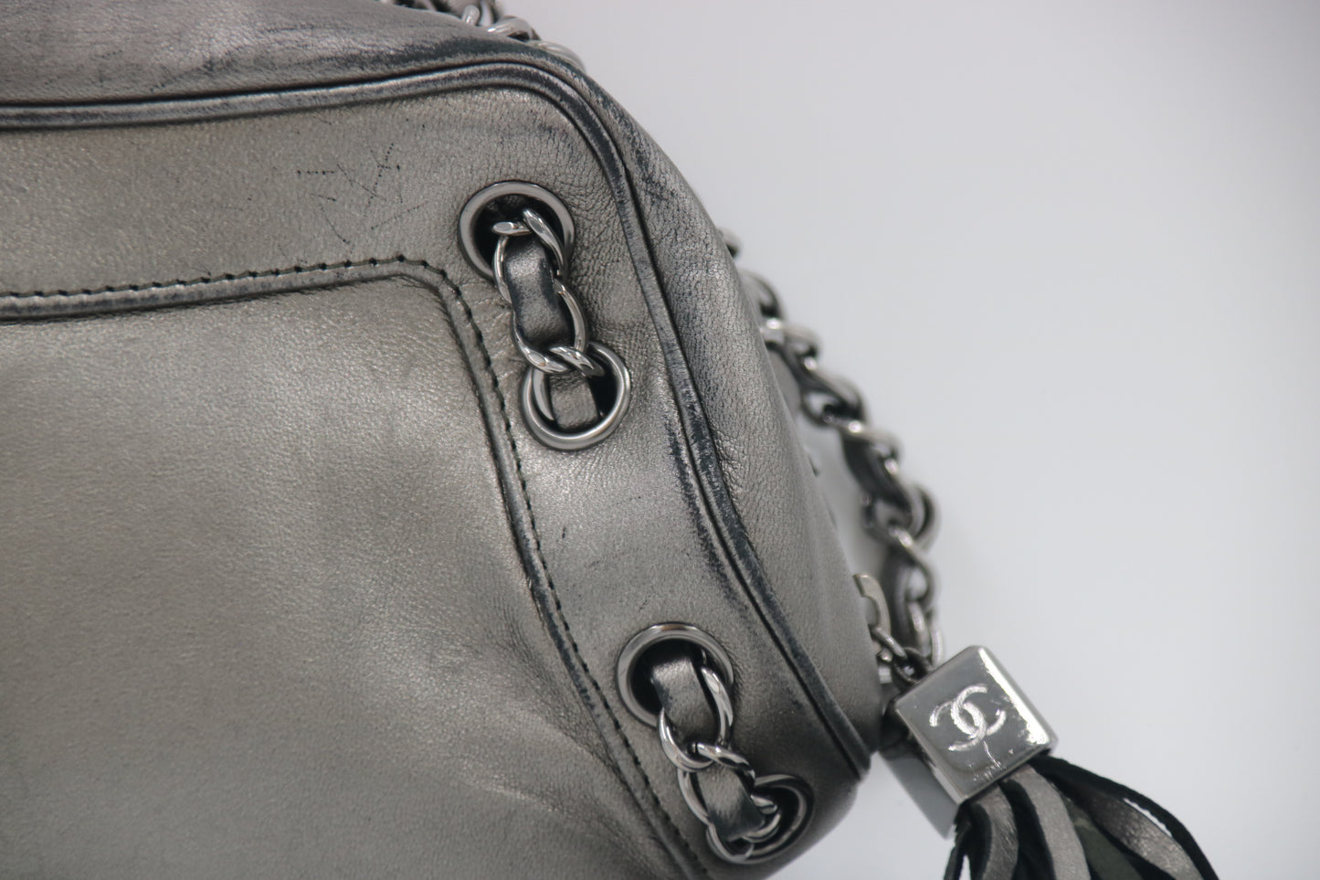 CHANEL Metallic Grey Leather Tassel Evening Bag