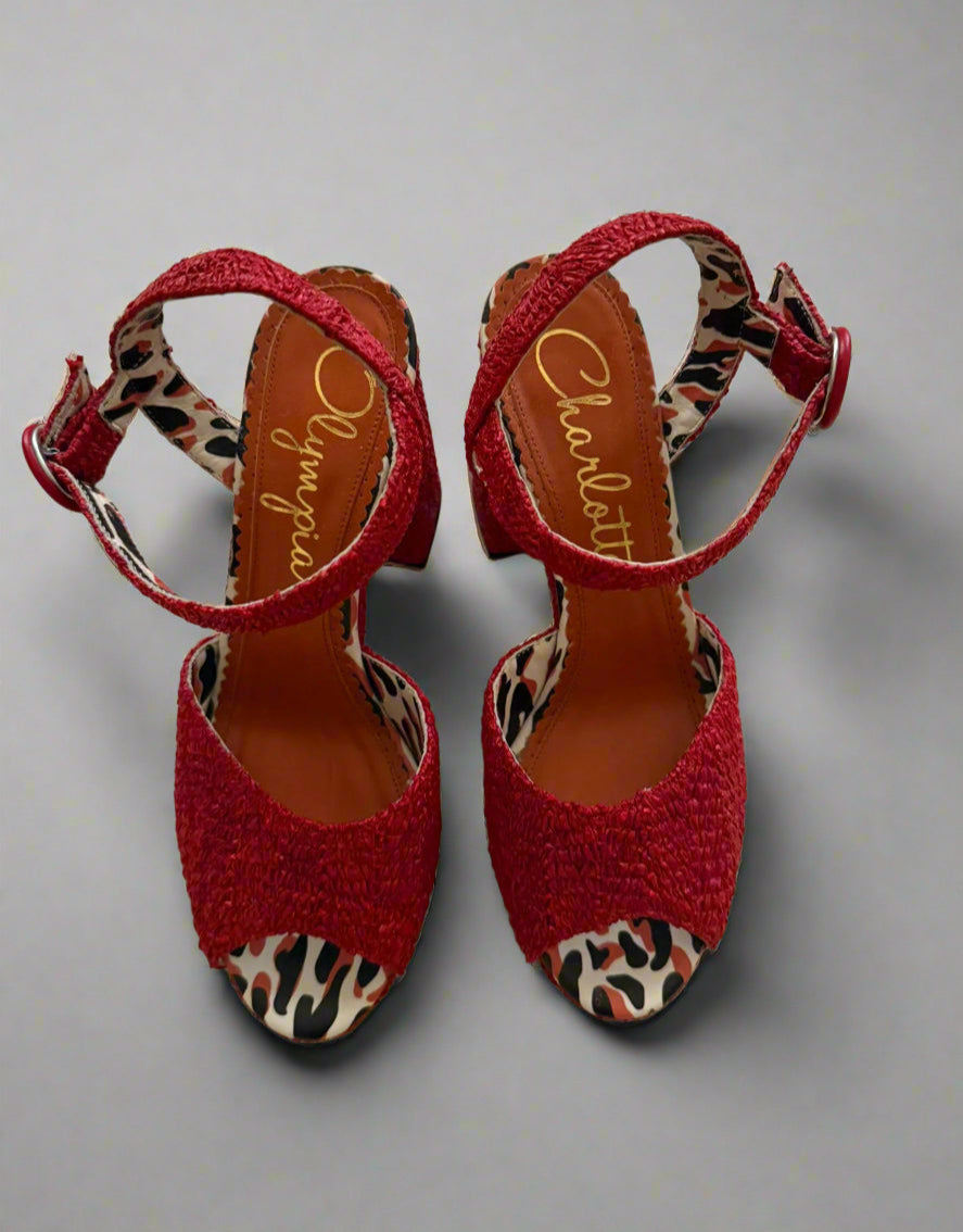 Red Charlotte Olympia raffia platform heels with ankle strap, featuring a chunky heel and leopard-print lining, worn only once, size IT 38, made in Italy.