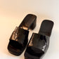 GUCCI black rubber logo slide sandals with embossed logo