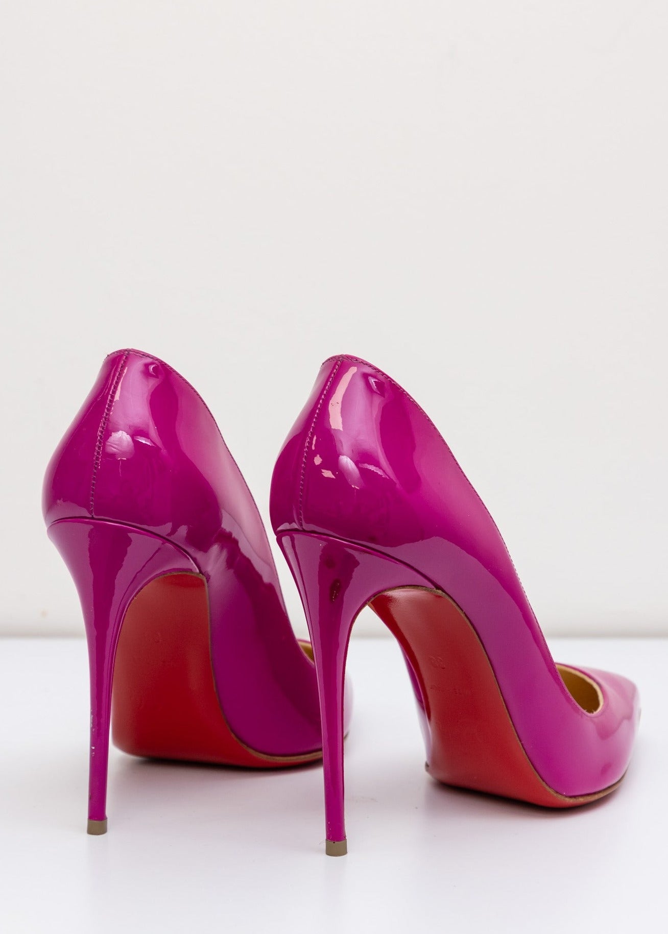 CHRISTIAN LOUBOUTIN Escarpins So Kate en cuir verni rose magenta