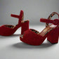 Red Charlotte Olympia raffia platform heels with ankle strap, featuring a chunky heel and leopard-print lining, worn only once, size IT 38, made in Italy.