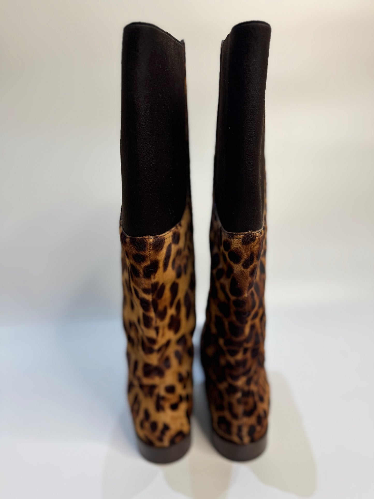 Back view of the boots, showing the clean lines and even leopard print pattern.