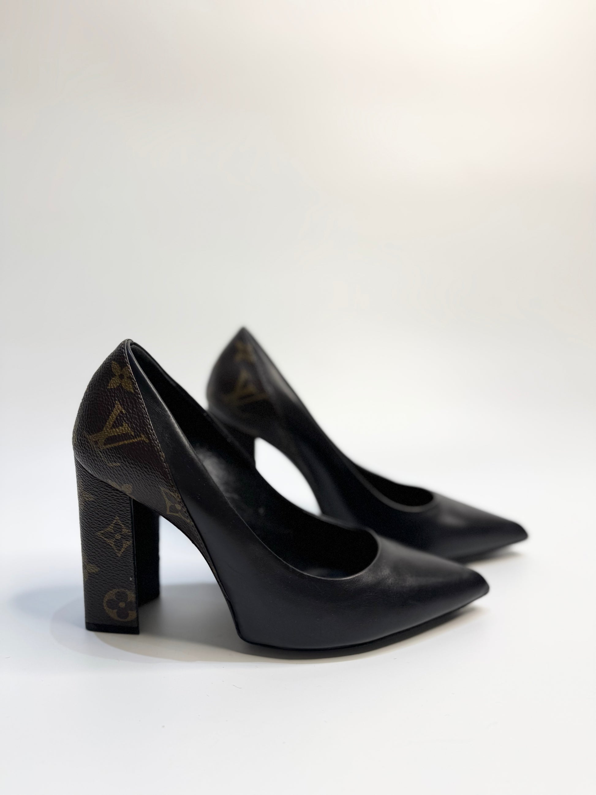 Louis Vuitton Black/Brown Leather and Monogram Canvas Pointed Toe Block Heel Pumps, Size 37.5 – Authentic designer shoes made in Italy, featuring premium leather, signature monogram canvas, and an elegant pointed toe with a stylish block heel.