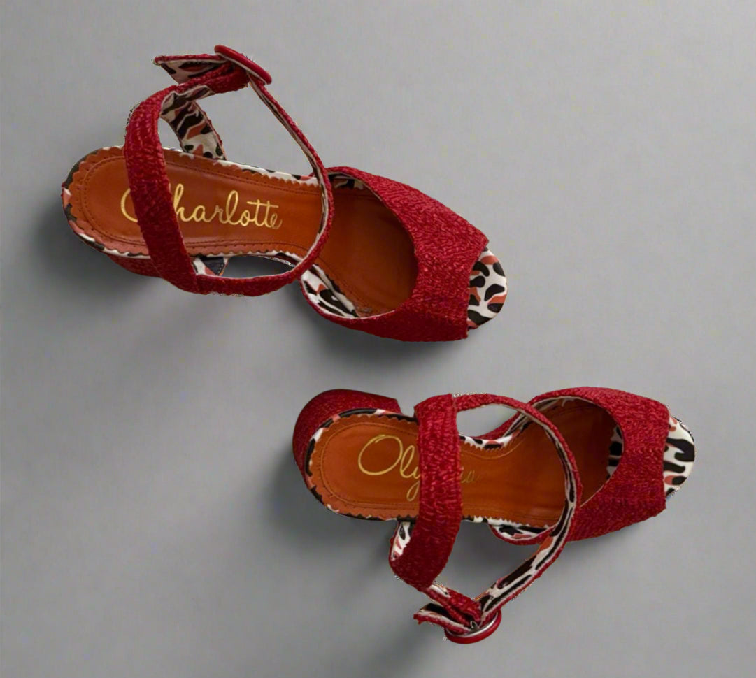 Red Charlotte Olympia raffia platform heels with ankle strap, featuring a chunky heel and leopard-print lining, worn only once, size IT 38, made in Italy.