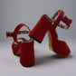 Red Charlotte Olympia raffia platform heels with ankle strap, featuring a chunky heel and leopard-print lining, worn only once, size IT 38, made in Italy.