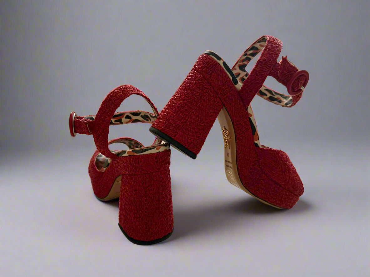 Red Charlotte Olympia raffia platform heels with ankle strap, featuring a chunky heel and leopard-print lining, worn only once, size IT 38, made in Italy.