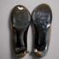 CHANEL Black Leather Pearl Heel Pumps (Size 38.5) | Authentic & Like New