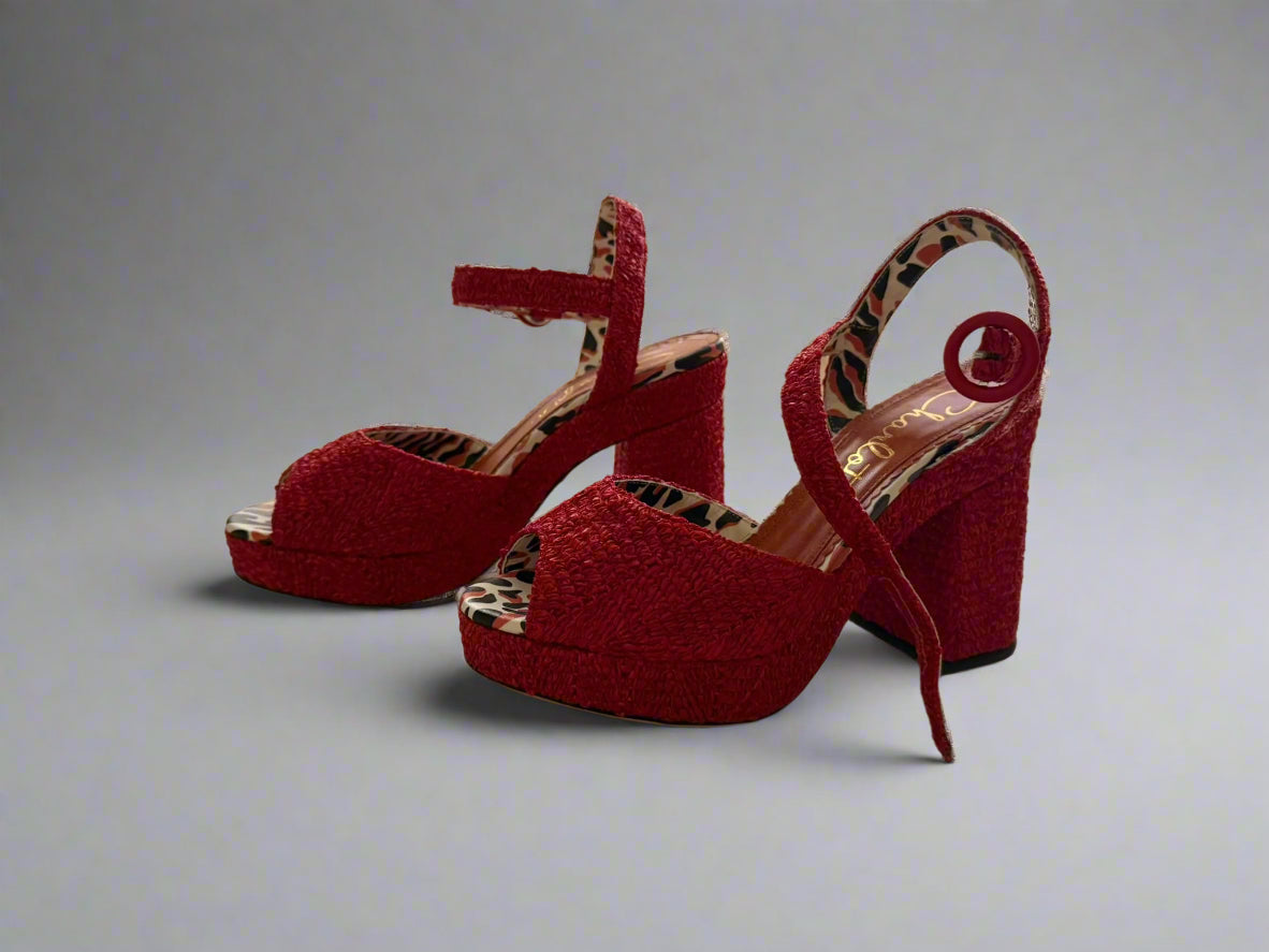 Red Charlotte Olympia raffia platform heels with ankle strap, featuring a chunky heel and leopard-print lining, worn only once, size IT 38, made in Italy.