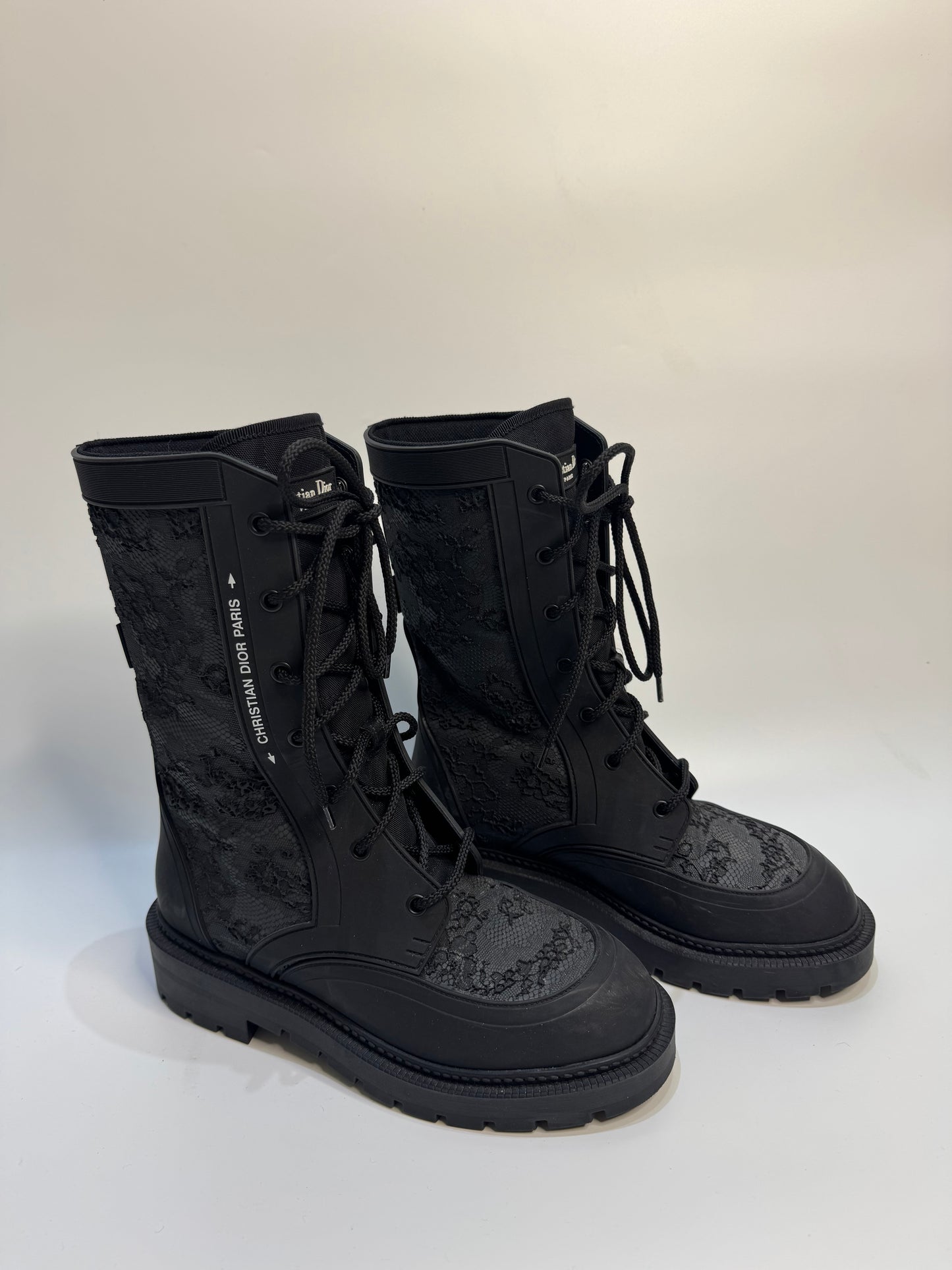 Christian Dior Black Lace Rubber Combat Boots Size 38 – Luxury Italian designer boots with lace-up style, durable rubber material, gripped soles for traction, and iconic CD logo. Stylish, versatile, and perfect for any occasion.