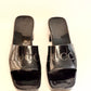 GUCCI black rubber logo slide sandals with embossed logo, size 38, front view