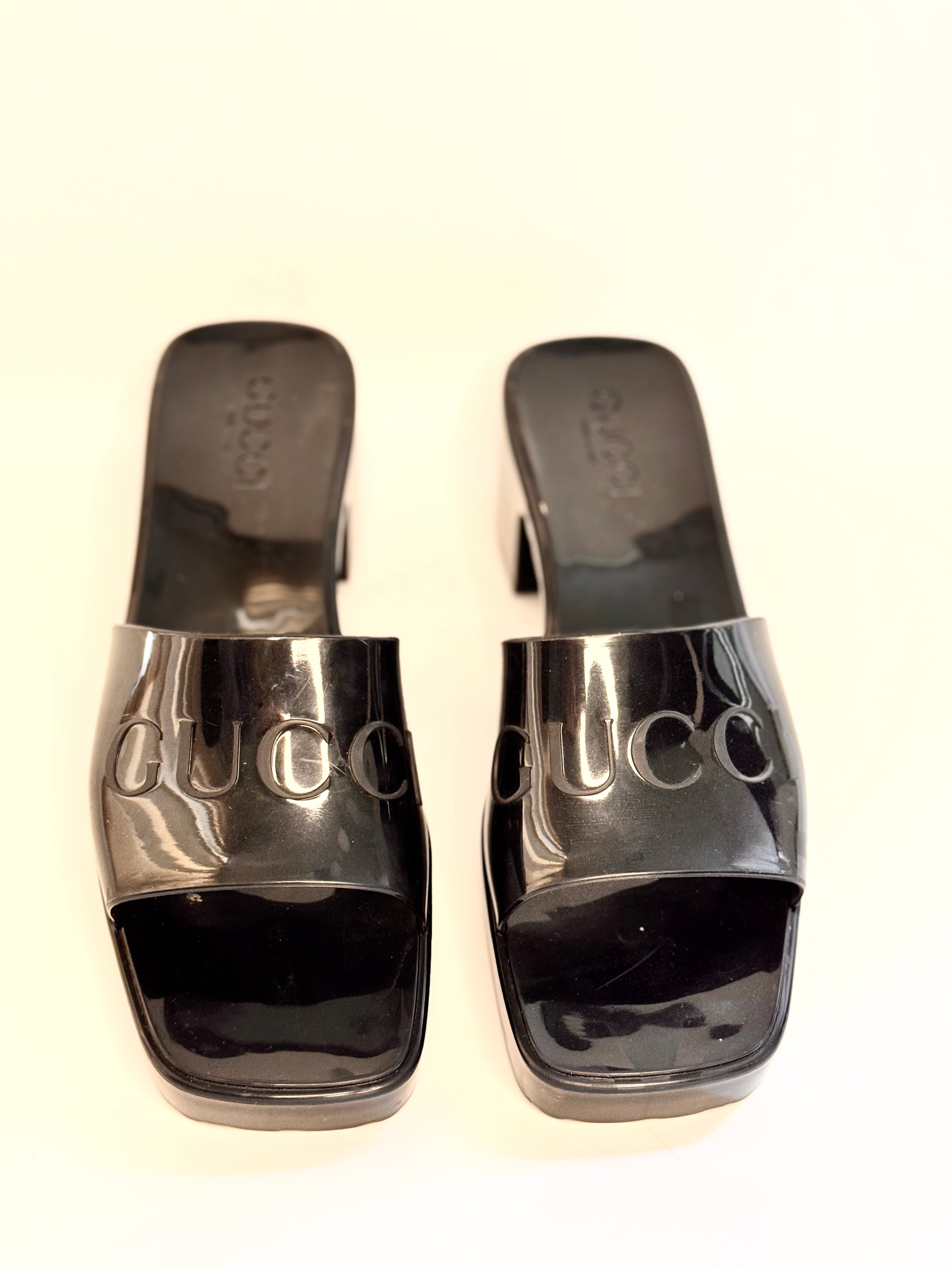 GUCCI black rubber logo slide sandals with embossed logo, size 38, front view