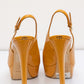 CHRISTIAN DIOR Оранжевые туфли-лодочки с ремешком на пятке и открытым носком