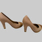 Chanel beige gold cap toe pumps with chain trim and block heel side view