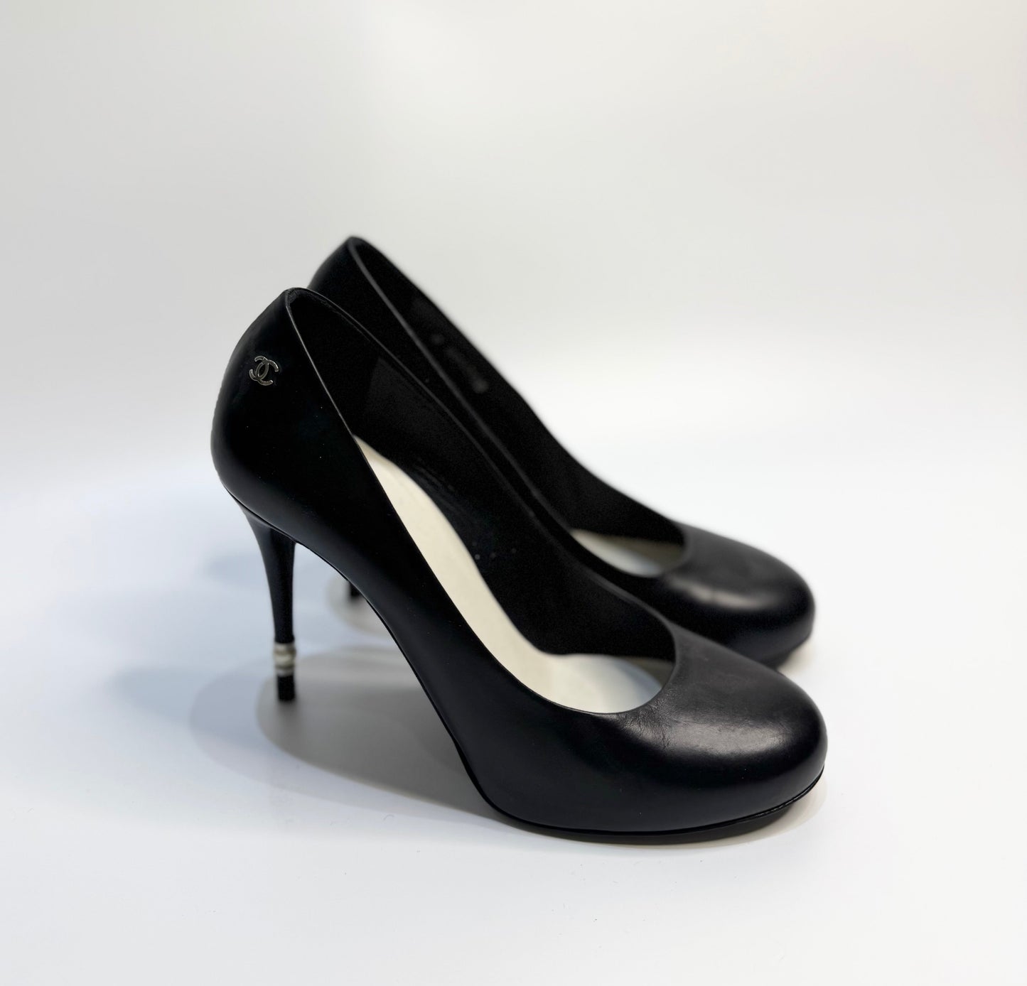 CHANEL Black Leather Pearl Heel Pumps (Size 38.5) | Authentic & Like New