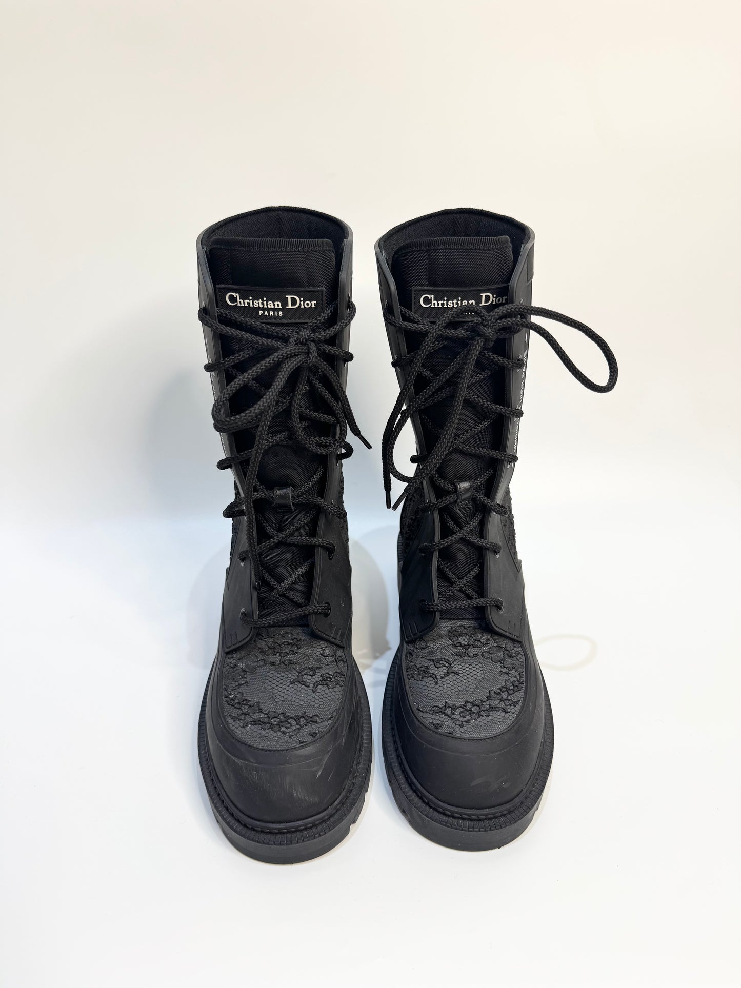 Christian Dior Black Lace Rubber Combat Boots Size 38 – Luxury Italian designer boots with lace-up style, durable rubber material, gripped soles for traction, and iconic CD logo. Stylish, versatile, and perfect for any occasion.