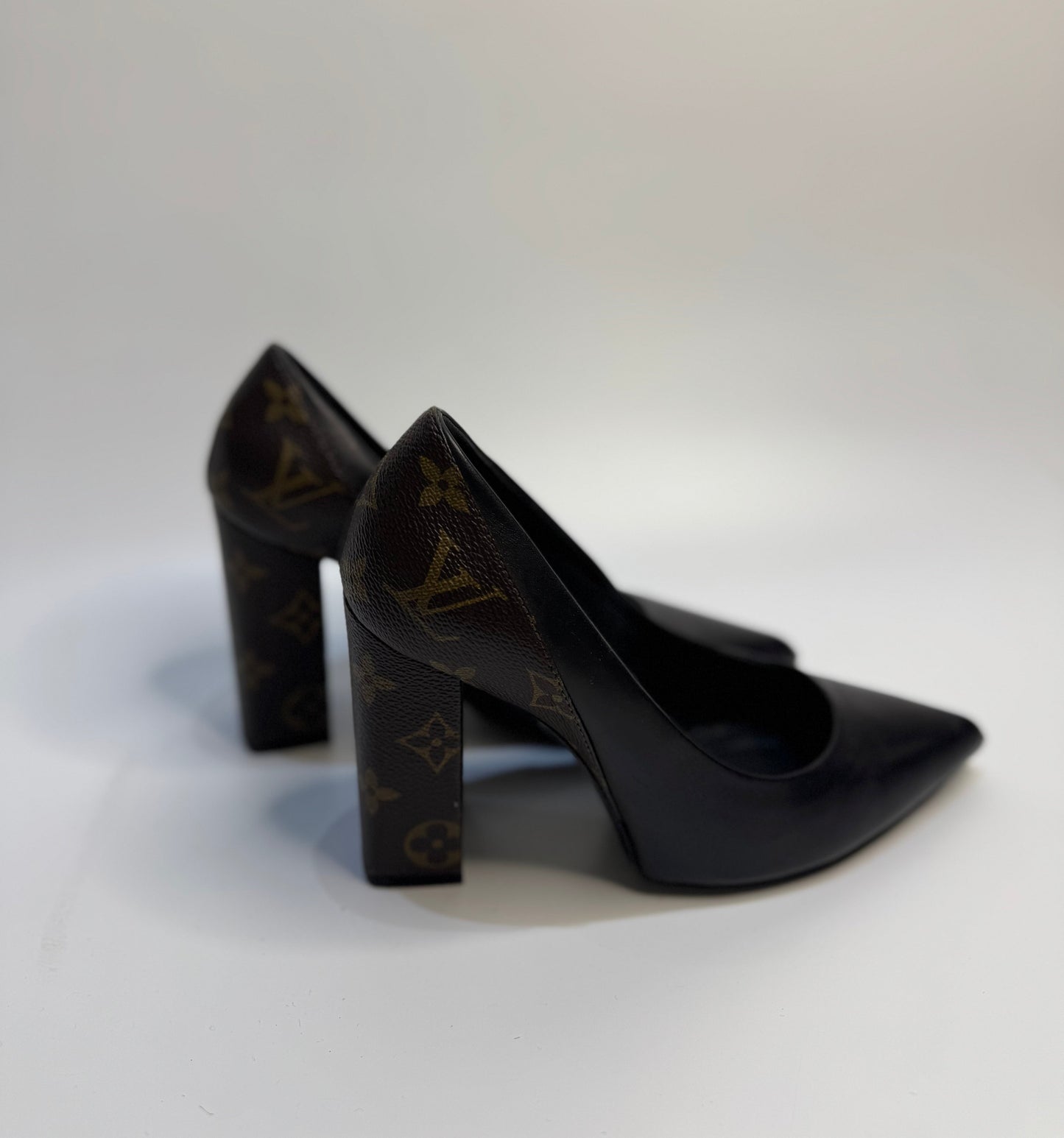 Louis Vuitton Black/Brown Leather and Monogram Canvas Pointed Toe Block Heel Pumps, Size 37.5 – Authentic designer shoes made in Italy, featuring premium leather, signature monogram canvas, and an elegant pointed toe with a stylish block heel.