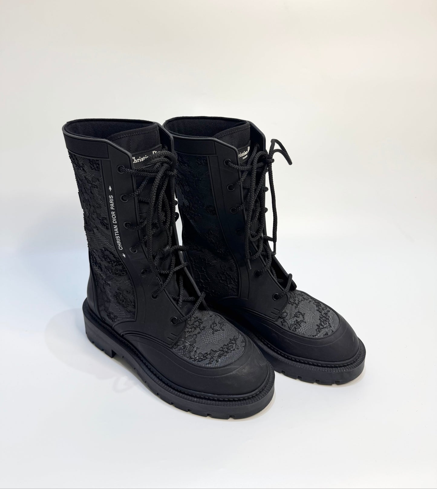 Christian Dior Black Lace Rubber Combat Boots Size 38 – Luxury Italian designer boots with lace-up style, durable rubber material, gripped soles for traction, and iconic CD logo. Stylish, versatile, and perfect for any occasion.