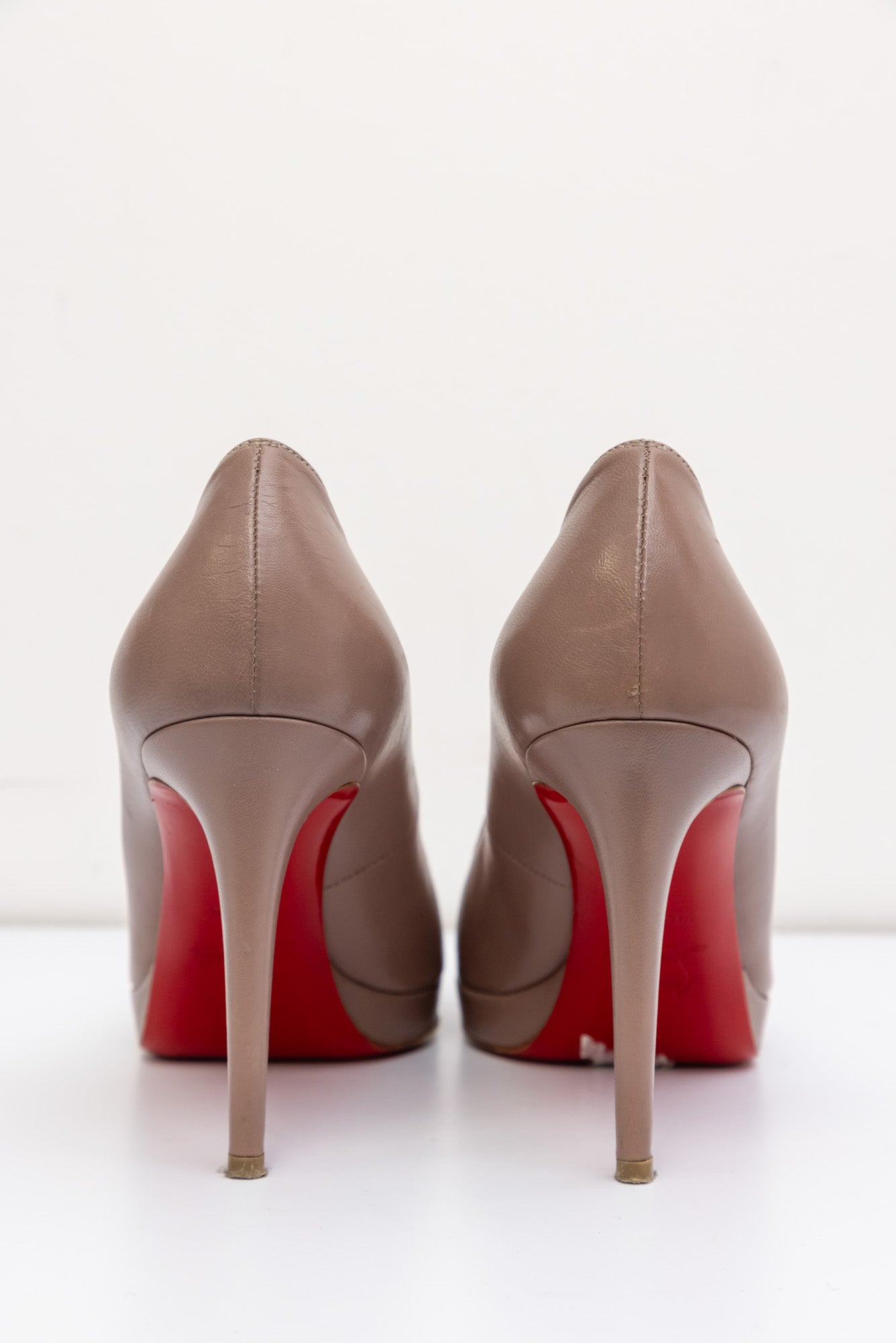 CHRISTIAN LOUBOUTIN Brown Leather Round Toe Platform Pumps