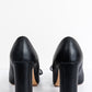 VALENTINO GARAVANI Черные кожаные туфли-лодочки на блочном каблуке с бантом