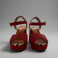 Red Charlotte Olympia raffia platform heels with ankle strap, featuring a chunky heel and leopard-print lining, worn only once, size IT 38, made in Italy.